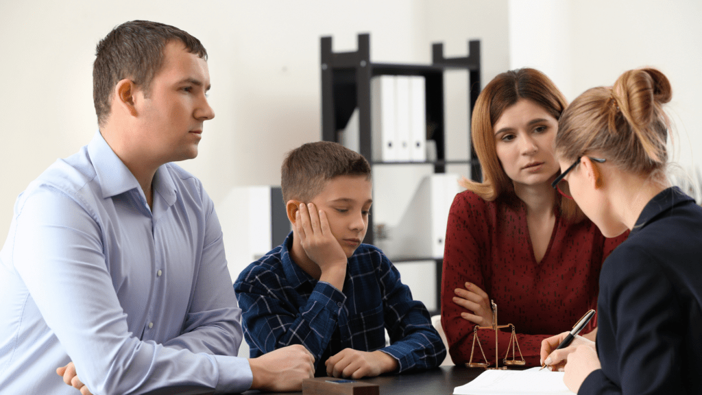Parents and Child with attorney in Custody talks
